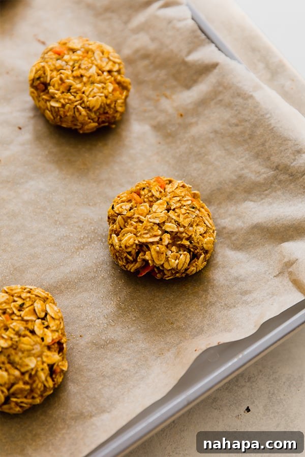 Freshly baked applesauce carrot cookies cooling on a wire rack