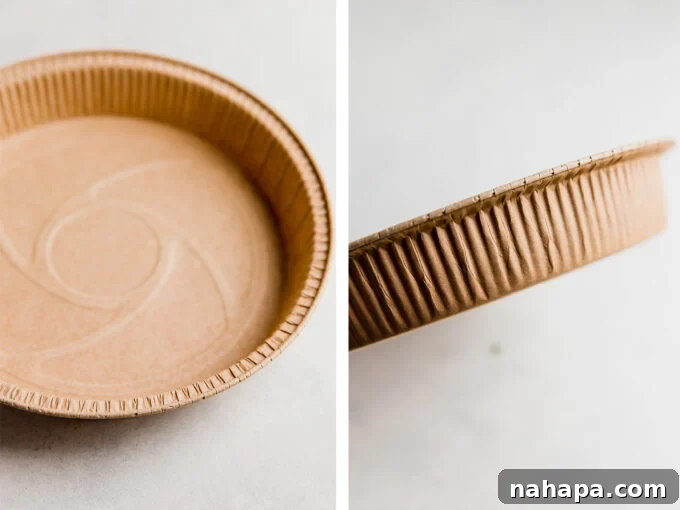 Disposable pie pans for making a sweet potato shepherd's pie freezer meal, showing multiple prepped pies.