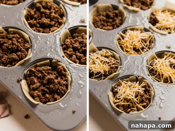 Stuffing the mini taco cups with ground beef and cheese, showing the filling process.