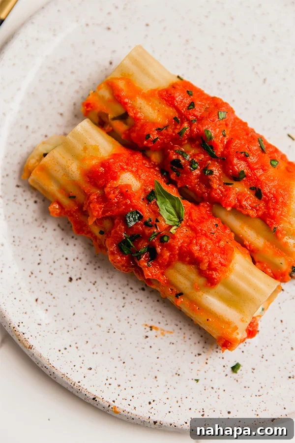 Savory Vegan Cauliflower Ricotta Manicotti Gluten Free 2 A beautifully plated gluten-free cauliflower manicotti dish, ready to be enjoyed.