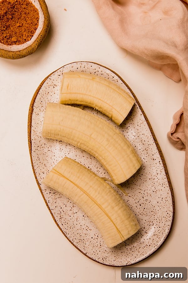 Close-up of fresh, ripe banana slices ready to be prepared for the banana lumpia recipe, highlighting their natural sweetness and texture.