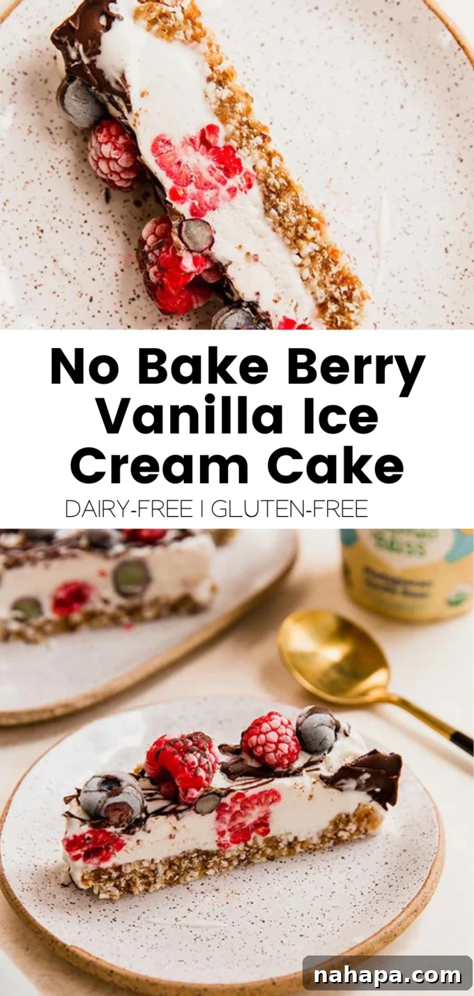 Full shot of the No-Bake Berry Vanilla Ice Cream Cake, garnished with fresh berries, on a cutting board, ready to be served.