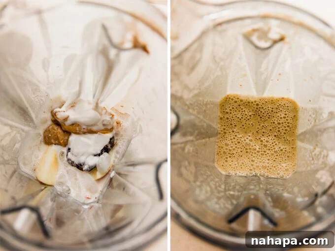 Orchard Fresh Sip 4 A blender jar filled with the apple smoothie ingredients midway through blending, showing a swirling mixture of apple, dates, and cinnamon.