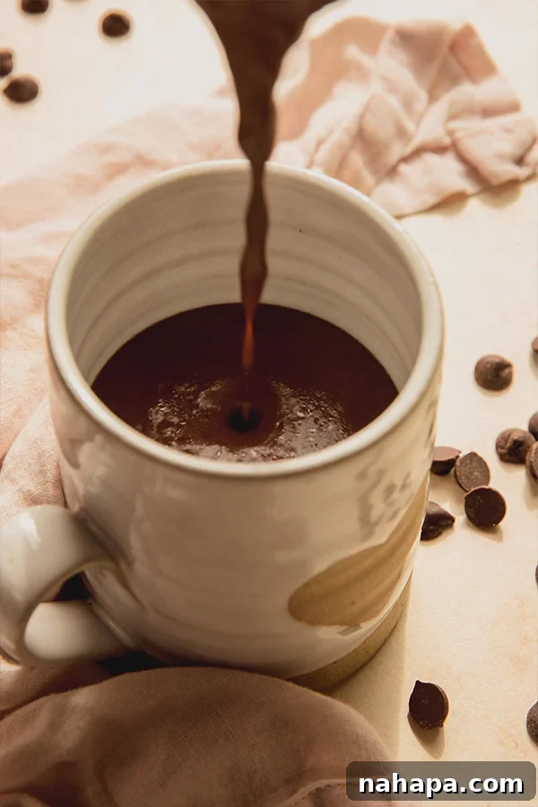 A mug of dairy-free Italian Hot Chocolate, ready to enjoy.