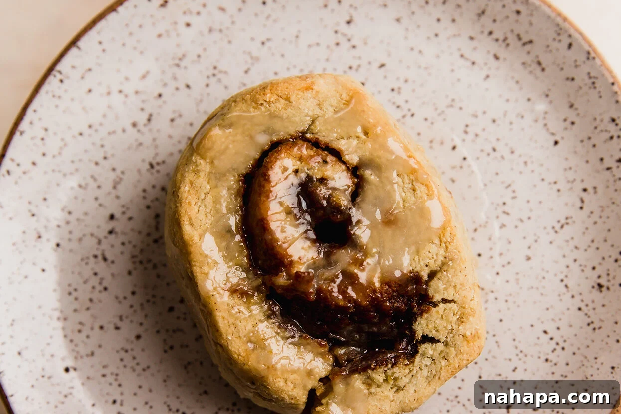 Delicious Gluten Free and AIP Gingerbread Cinnamon Rolls 8 Gingerbread cinnamon roll drizzled with icing.