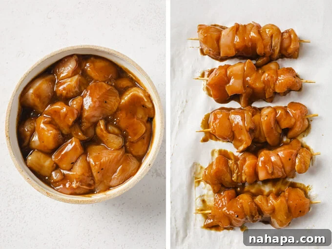 Sticky Teriyaki Chicken Skewers with Slaw 4 Cubed chicken breast marinating in teriyaki sauce, with some pieces already threaded onto bamboo skewers.