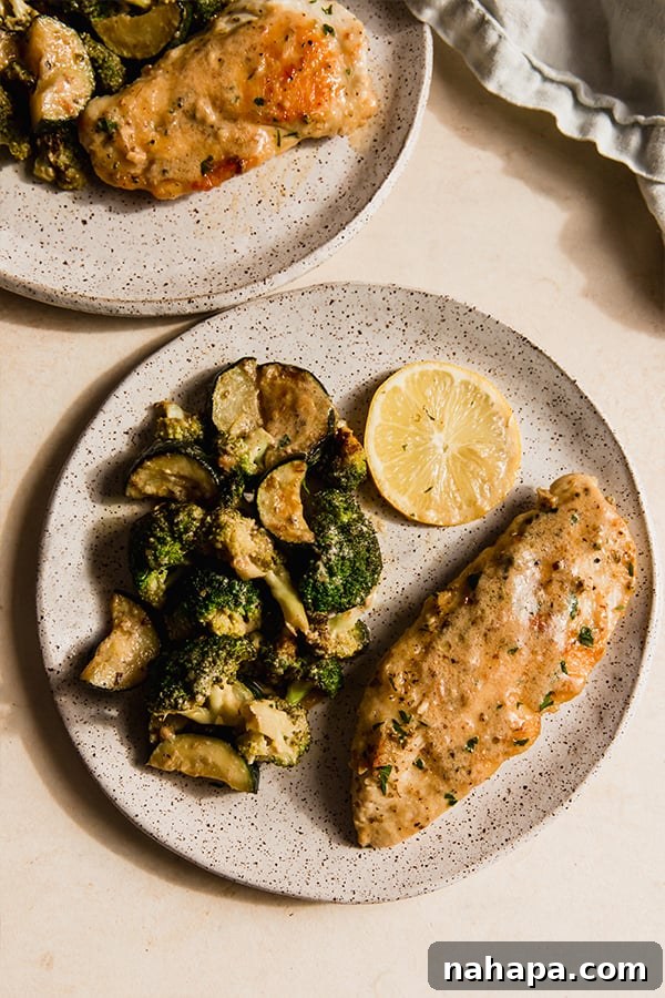 A plate with one-pan creamy garlic chicken & vegetables