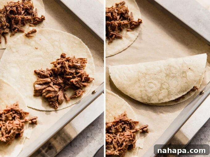 The shredded beef tacos on a baking sheet before and after folding them, illustrating the assembly process.