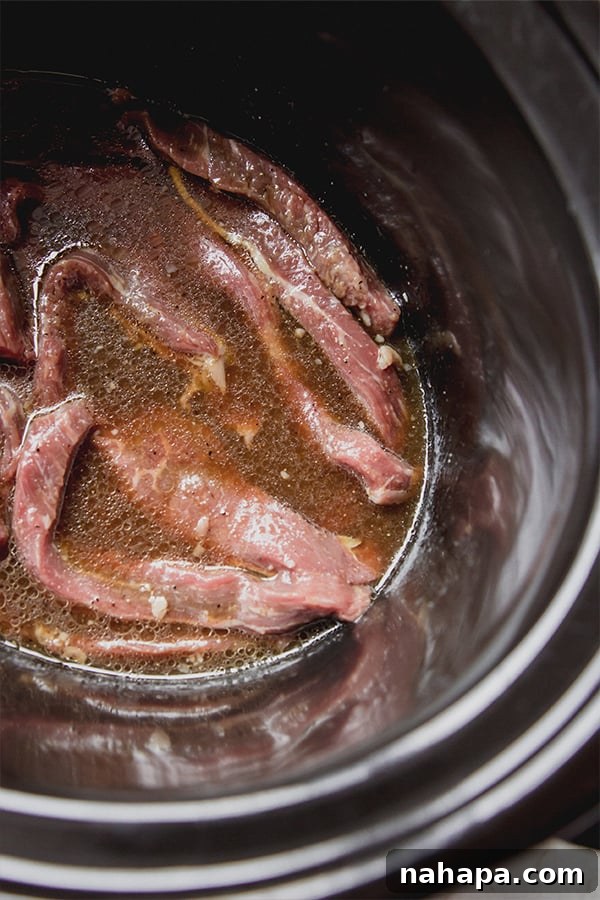 Savory Citrus Beef Slow Cooked Gluten Free AIP Friendly 3 Seasoned beef in a slow cooker