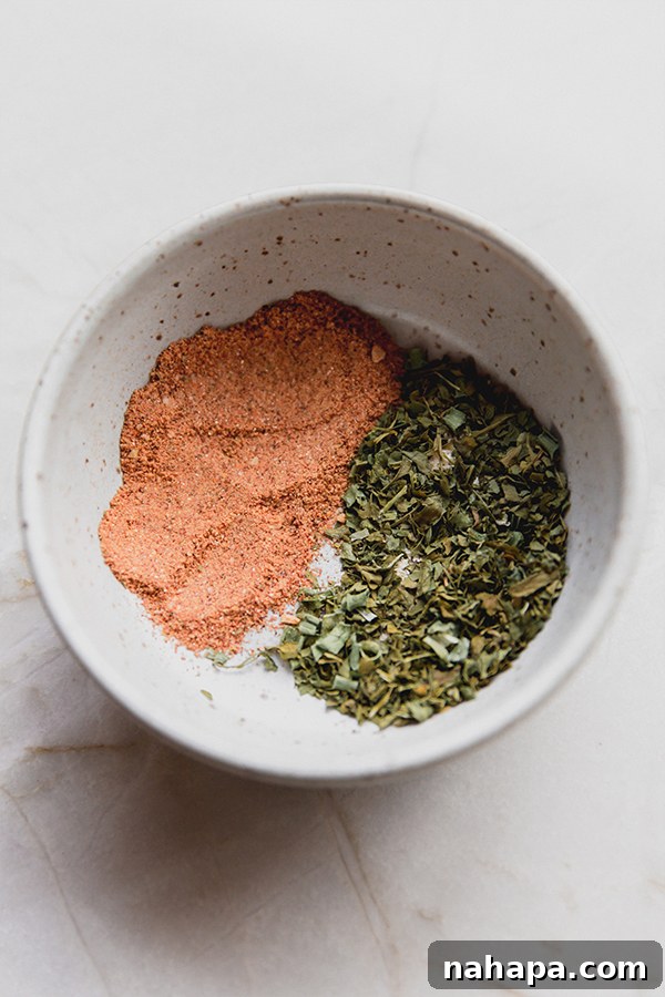 A selection of ranch powder and taco seasoning, ready to be used in slow cooker ranch chicken tacos.