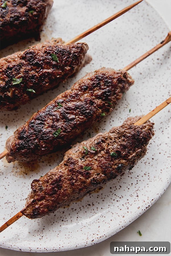Grilled Beef Kofta Skewers Cooking on a Grill Pan