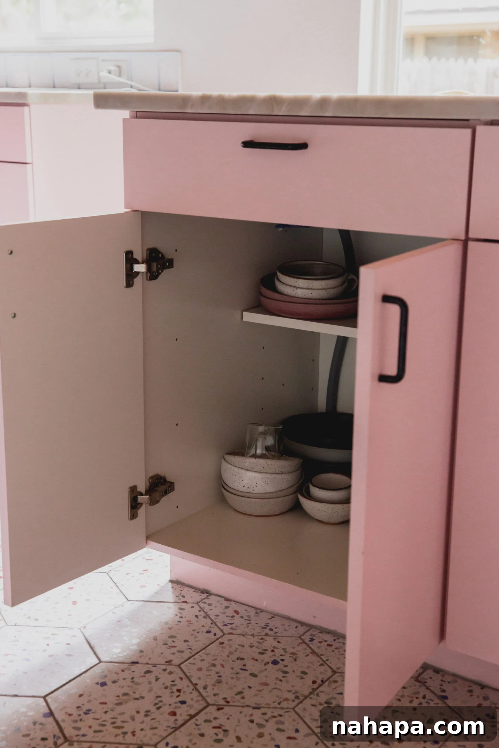 Kitchen island with built-in storage for photography props