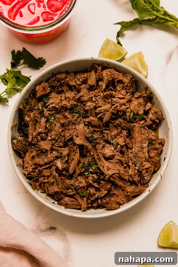 Set It and Forget It: 20+ Delicious Gluten-Free Slow Cooker Meals 8 Slow Cooker Barbacoa Beef in a bowl with toppings