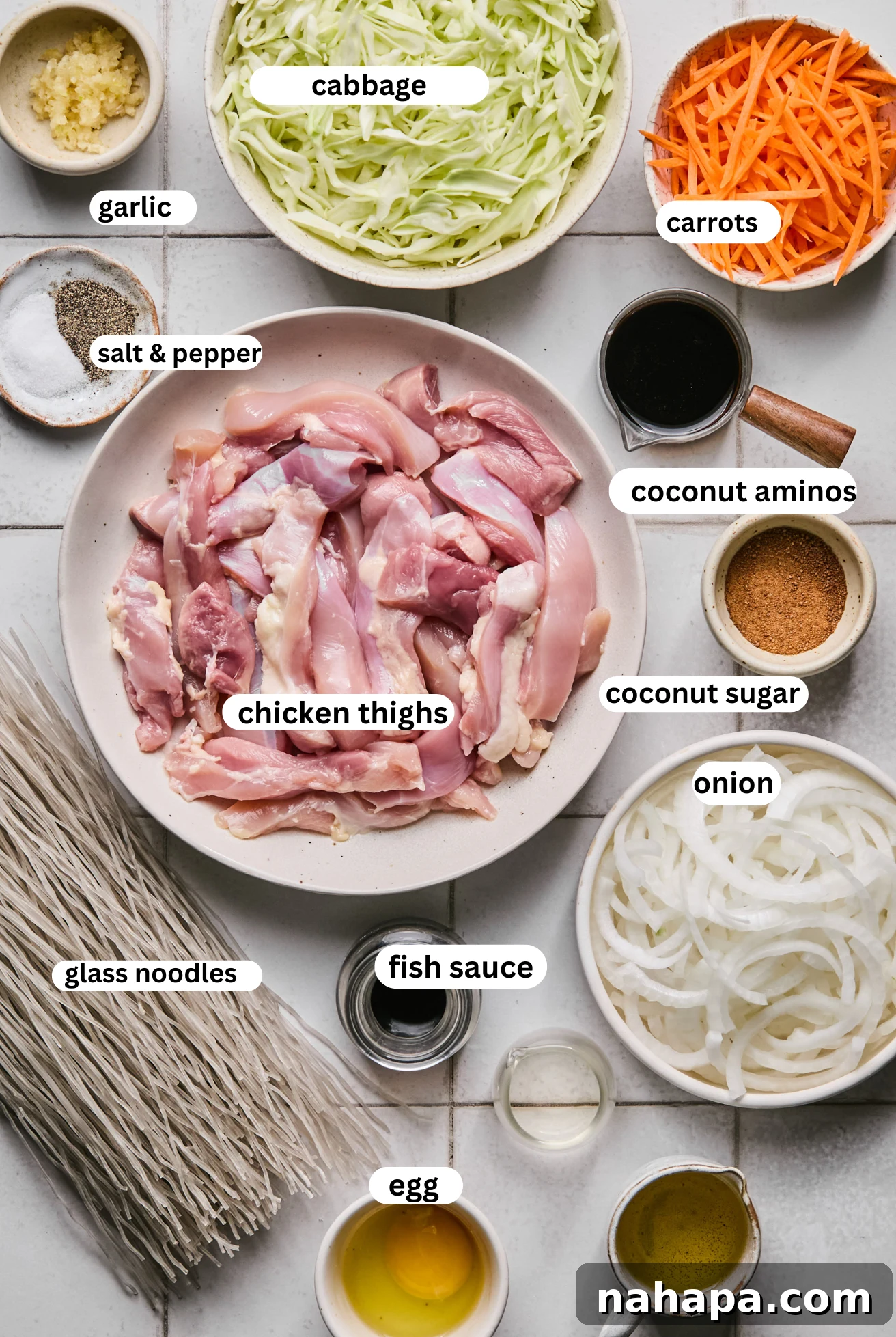 Pad Woon Sen Flavorful Gluten Free Glass Noodle Stir Fry 3 Separate bowls containing all the fresh ingredients needed for Pad Woon Sen, including glass noodles, sliced chicken, various vegetables, and sauce components.