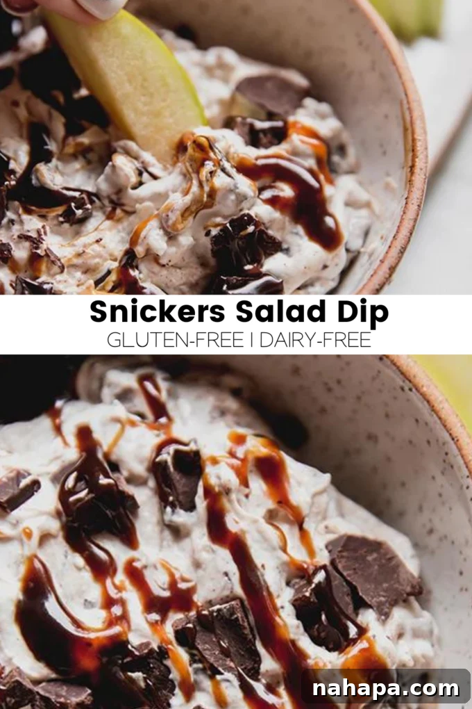 A large rectangular image showcasing the final Snickers Salad Dip in a bowl with various sliced apples around it.