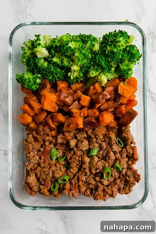 15 Simple Gluten and Dairy Free Lunch Solutions 6 Sloppy Joe meal prep bowls featuring ground meat, sauce, and a side of green beans.