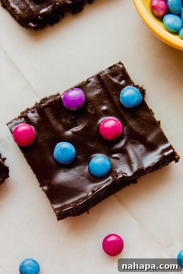 Stack of sliced almond flour space brownies with crispy quinoa gems
