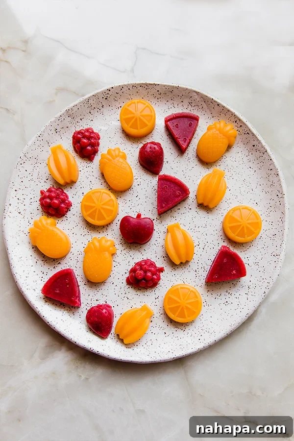 A beautifully arranged plate overflowing with freshly made homemade fruit snacks, ready to be enjoyed.