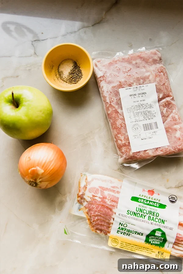 All the fresh ingredients laid out on a clean surface, ready to be combined for the delicious apple chicken burgers, showcasing vibrant colors and textures.
