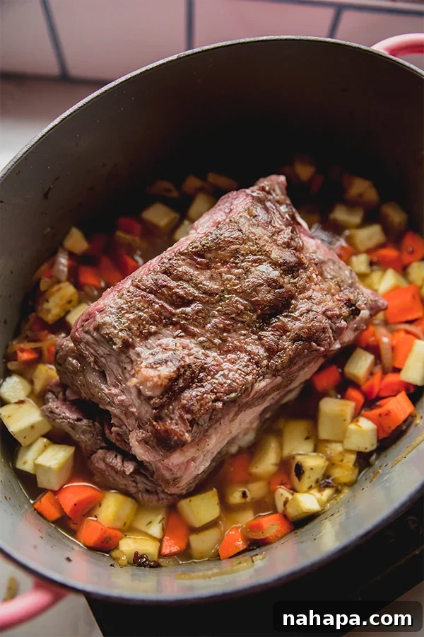 Tender Apple Cider Braised Beef 3 The apple cider braised pot roast before baking.