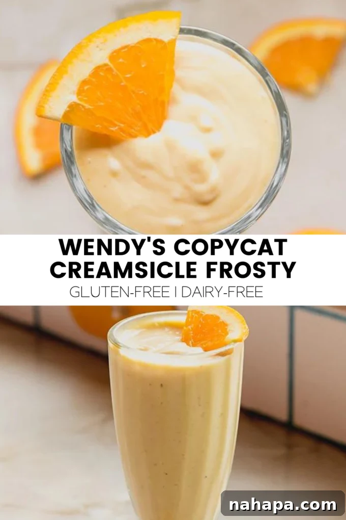 Wendy's Inspired Dairy-Free Creamsicle Frosty 6 A final large image showing a perfectly blended creamsicle frosty in a glass, ready to be enjoyed, with a focus on its smooth, inviting texture.