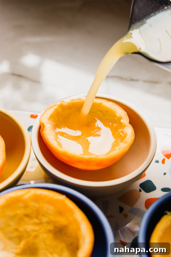 Preparing orange peels, showing the process of hollowing out the fruit.