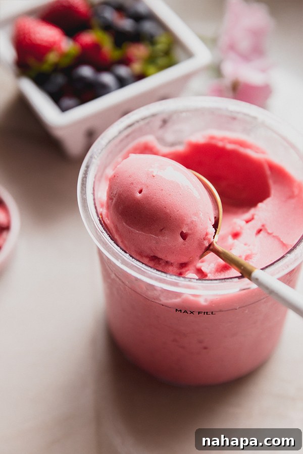 Close-up of the creamy texture of the Ninja Creami Strawberry Pink Drink Sorbet.