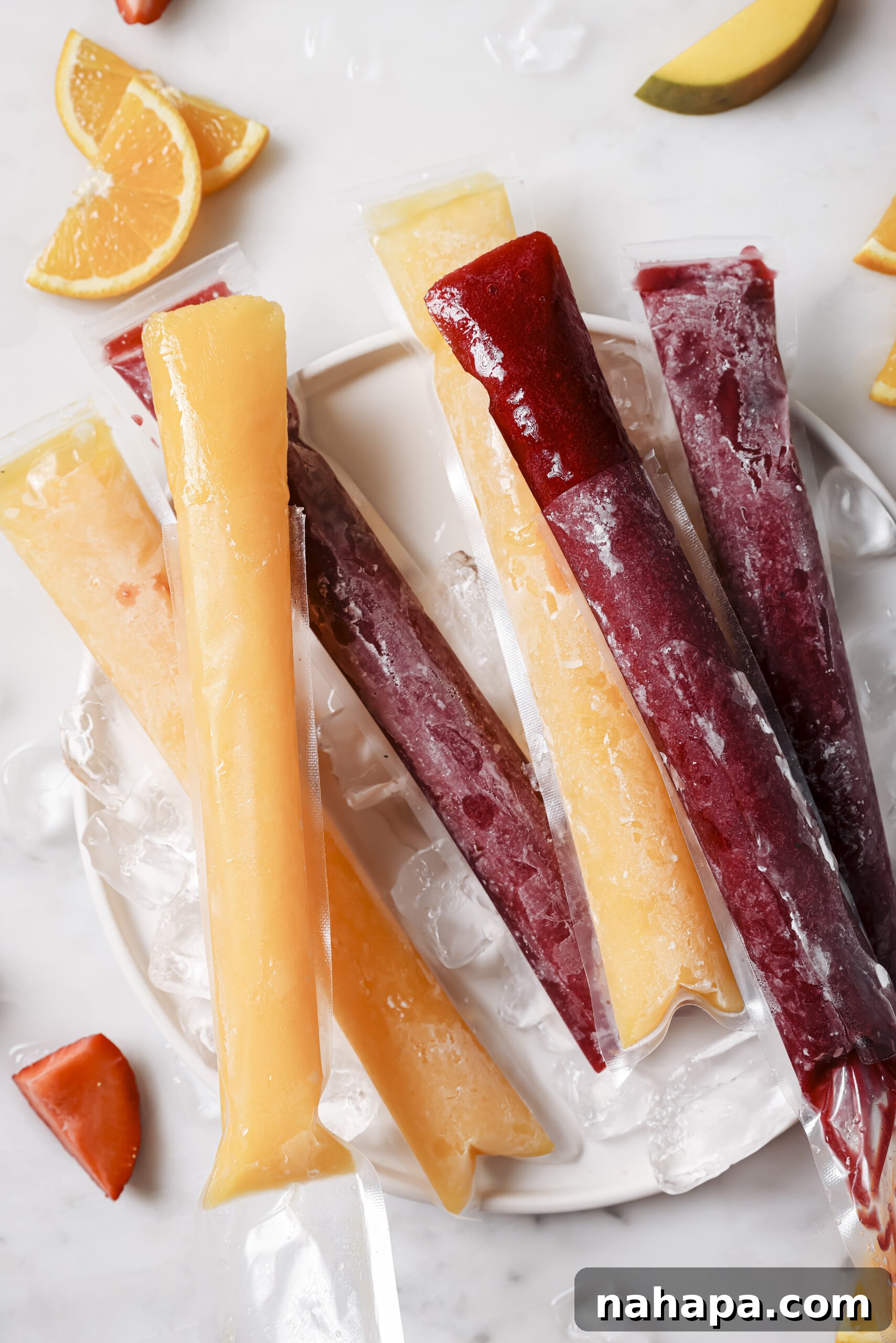 A collection of colorful fruit and veggie freezer pops
