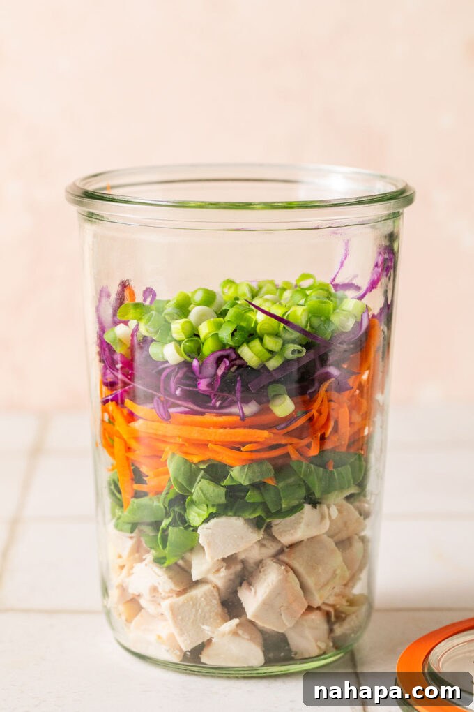 Elevated Gluten-Free Noodle Cups: Healthy Homemade Comfort 5 Cooked chicken, veggies, and green onion layered in a glass jar.