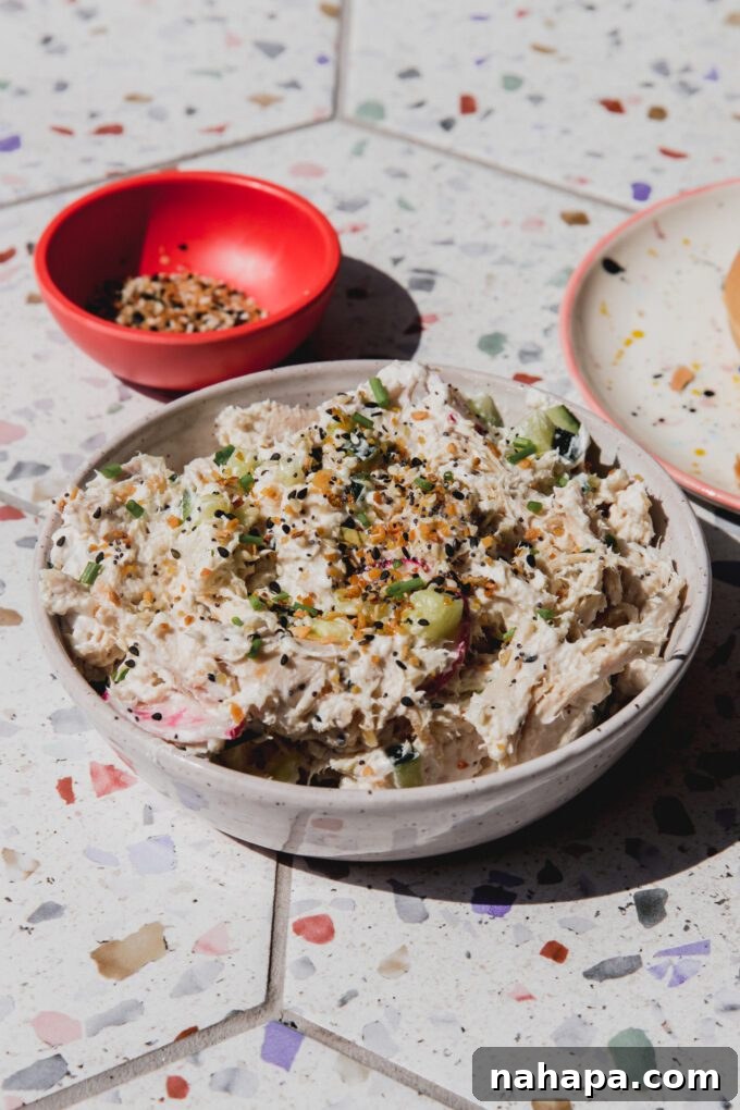 Everything Bagel Crunch Chicken Salad Dairy Free 2 Bagel chicken salad topped with everything bagel seasoning in a bowl.