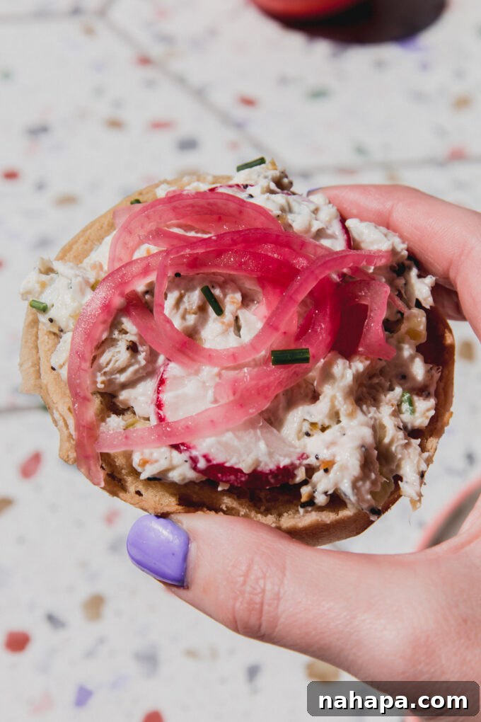 Everything Bagel Crunch Chicken Salad Dairy Free 4 Bagel chicken salad on a gluten free bagel, topped with radishes and red onion.