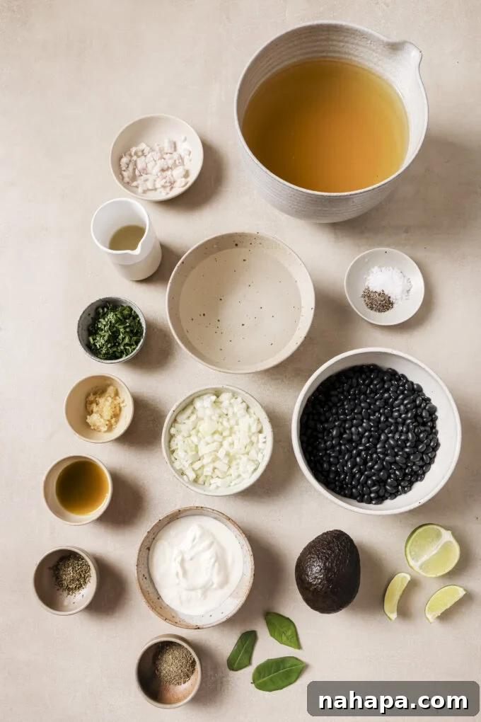 Refried bean ingredients in seperate bowls all laid out.