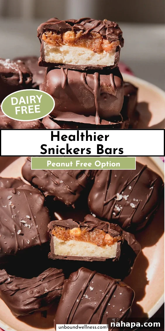 Guilt-Free Snickers Bliss 9 A final hero shot featuring a platter of healthier Snickers bars, some whole and one cut in half, inviting viewers to indulge in the homemade treat.