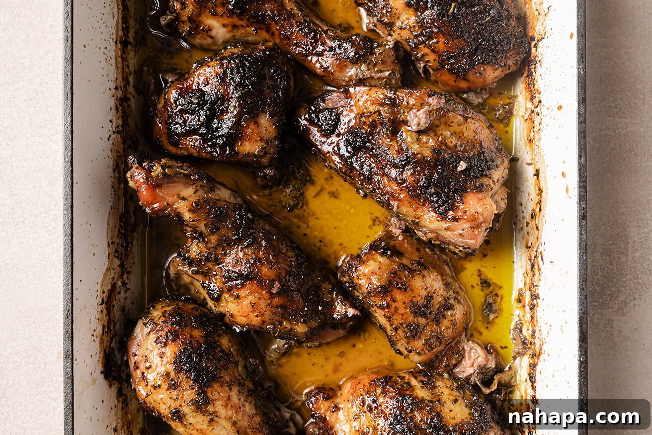 Cooked turkey wings in a baking pan.