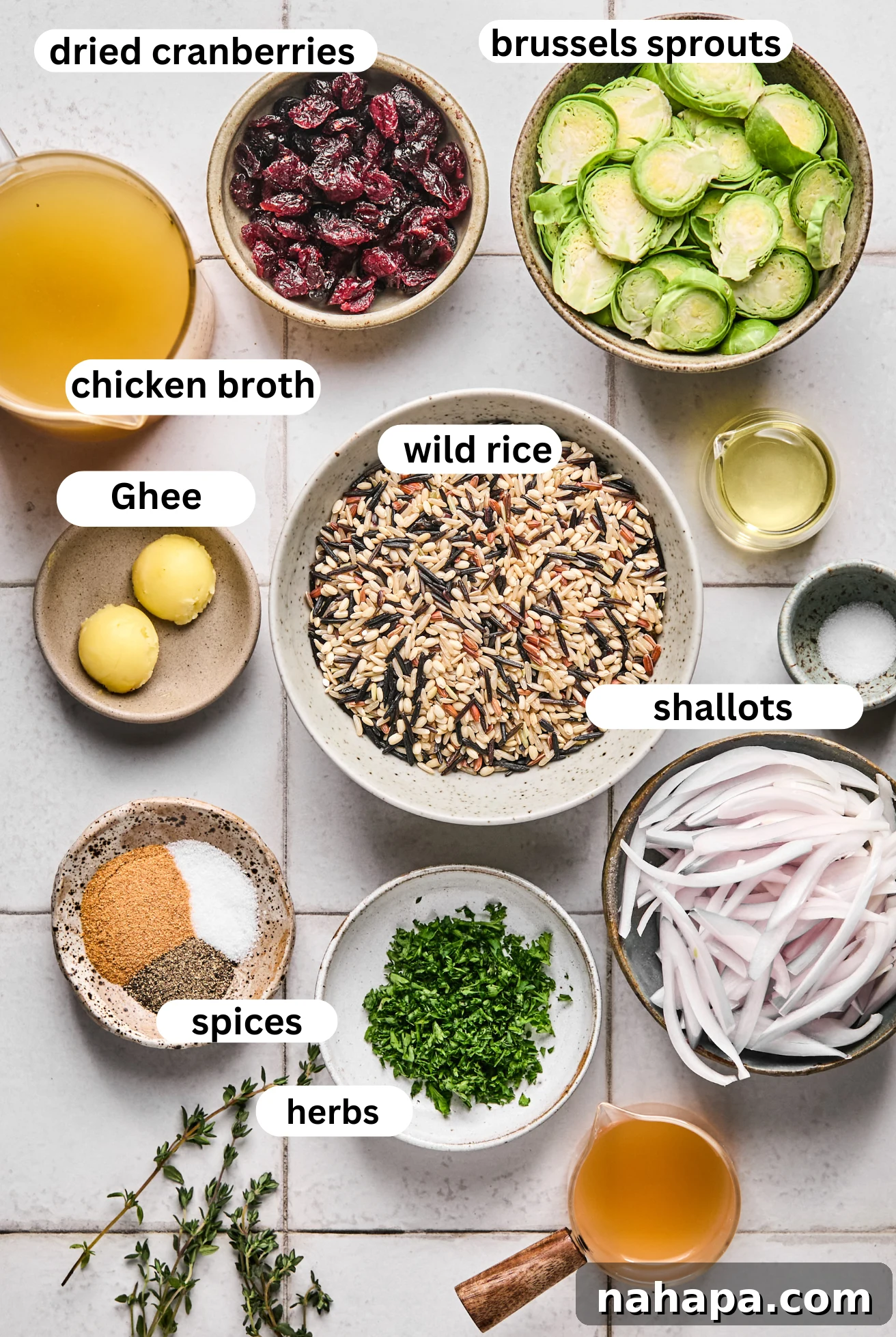 Crispy wild rice pilaf ingredients laid out in bowls.