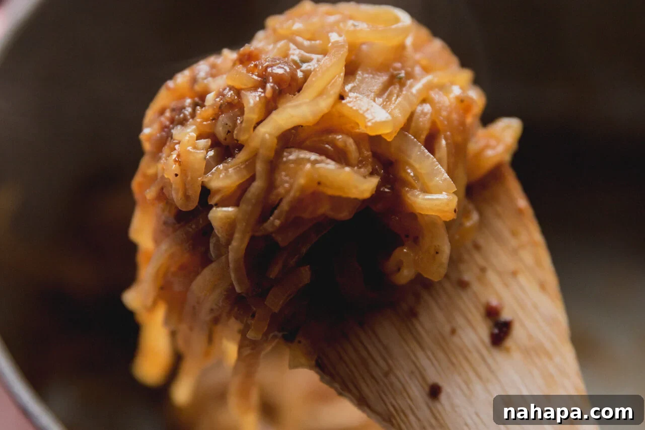 French Onion Braised Beef 8 Sliced yellow onions, softened and lightly golden, after being sautéed in the Dutch oven, releasing their sweet aromas.