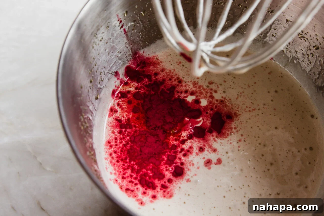 Sweet Pink Cloud Bites 4 marshmallow base in a mixing bowl with honey, gelatin, and beet powder
