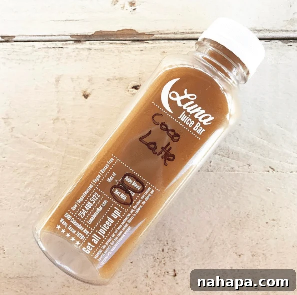 A bottle of coco latte from Luca Juice Bar.