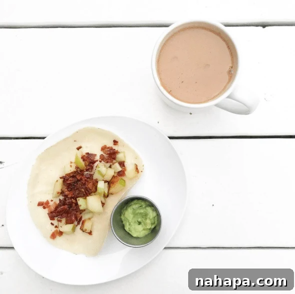 A mug with a plate with a taco on it.