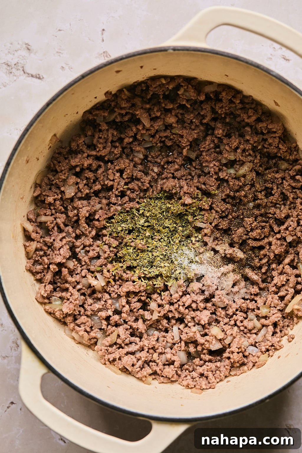 ground beef, onions, and spices sauted on stovetop