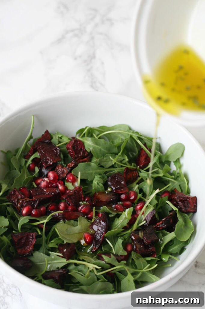 Breaking the Gut Healing Stalemate: What You're Missing 3 A bowl with greens and pomegranate seeds on it.