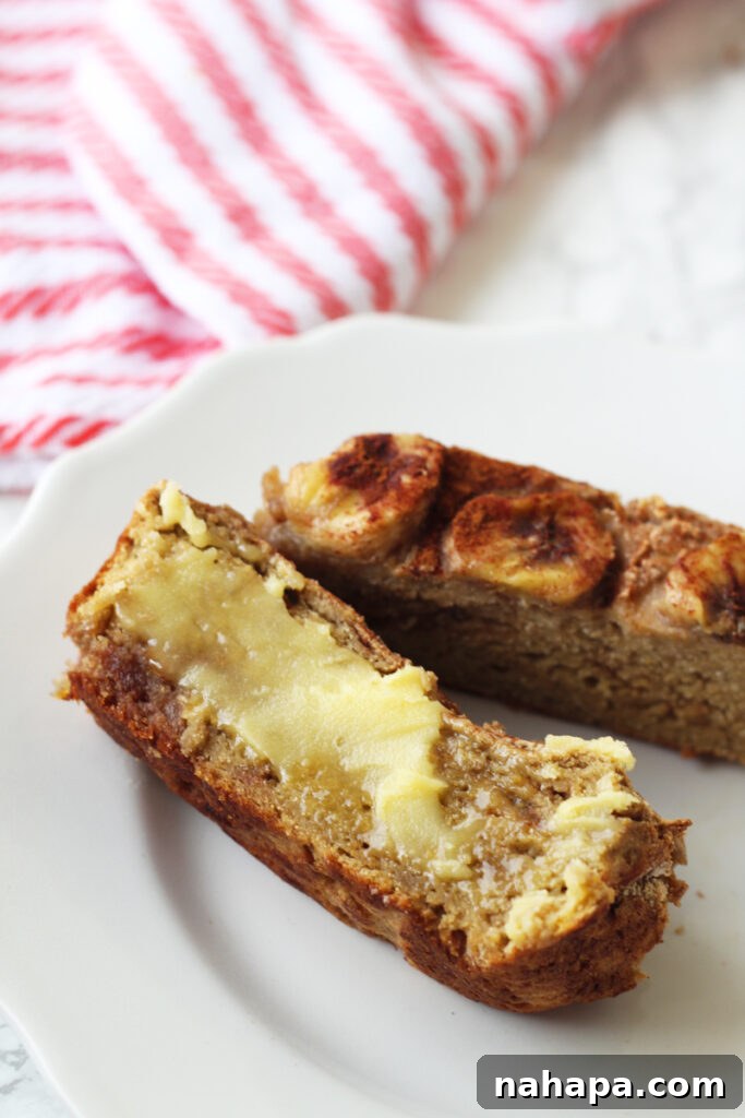 A close-up shot of Plantain Banana Bread, highlighting its moist texture and golden crust, ideal for AIP, Paleo, and Vegan lifestyles.