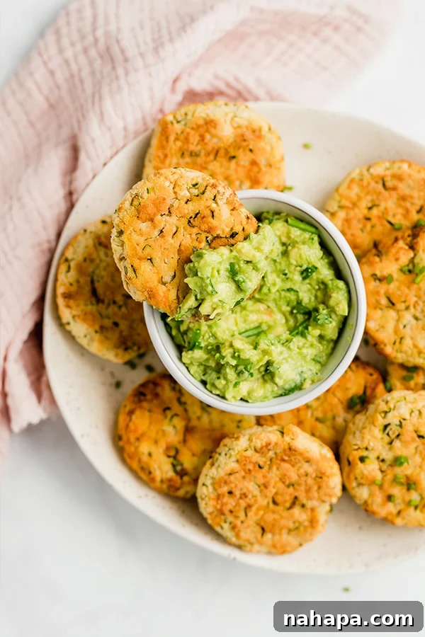 AIP Compliant Paleo Veggie Nuggets Gluten and Dairy Free 6 baked veggie nuggets on plate with guacamole and a bite out of one nugget