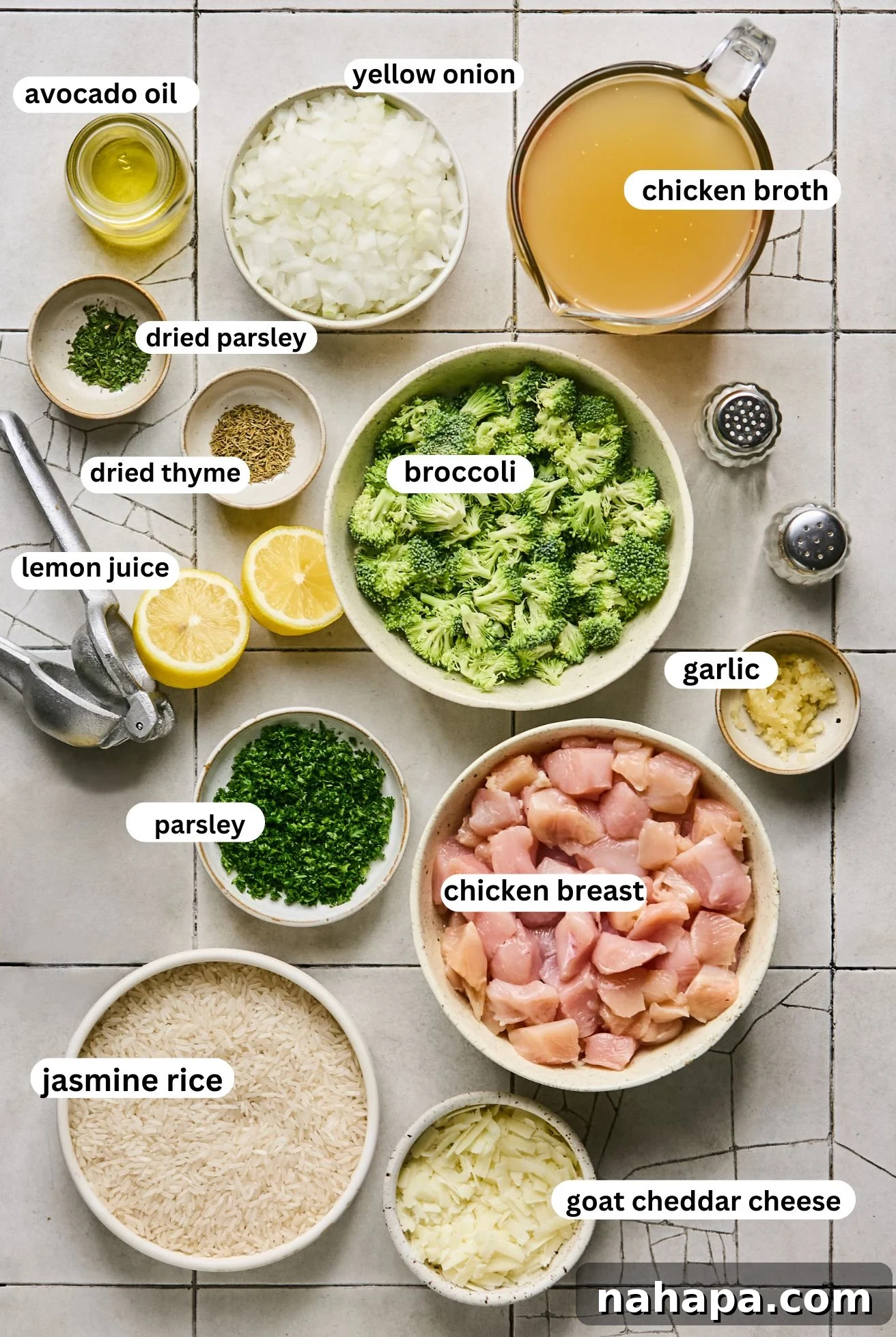 separated ingredients for broccoli cheddar chicken and rice in various bowls, ready for cooking