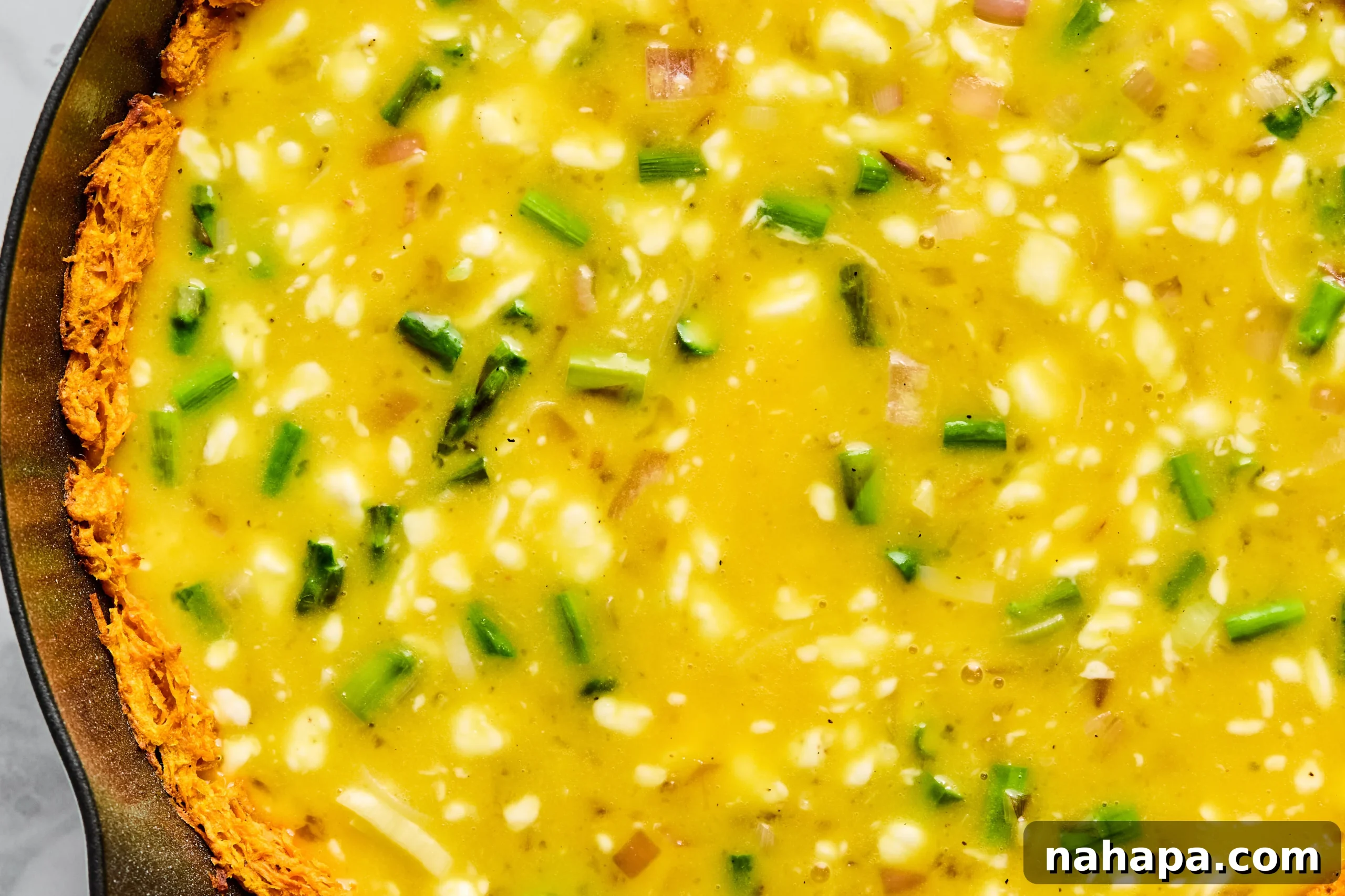The egg mixture poured on top of the baked crust.