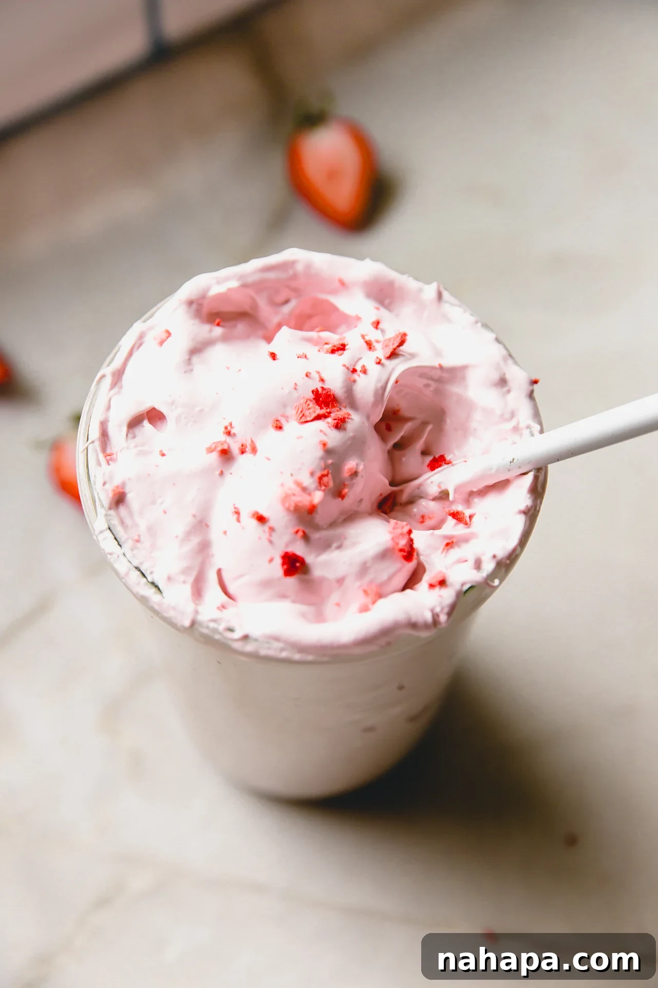 Blushing Berry Mallow Fluff 11 Strawberry marshmallow fluff in a glass jar topped off with crushed freeze dried strawberries.