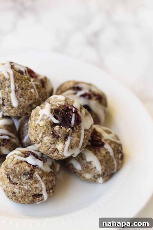 Gut-Healing Collagen Veggie Bites (Paleo and AIP) 2 A beautifully arranged stack of vibrant green collagen veggie fat balls resting on a pristine white plate, ready to be enjoyed as a healthy snack.