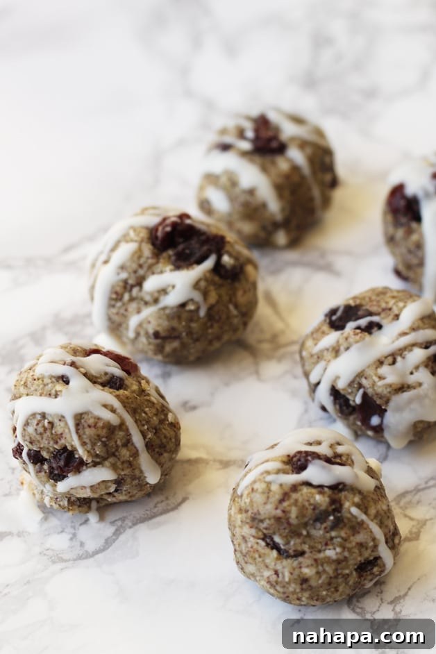 Gut-Healing Collagen Veggie Bites (Paleo and AIP) 4 A neat row of vibrant Collagen Veggie Fat Balls lined up on a kitchen counter, showcasing their appealing appearance and readiness to be enjoyed.