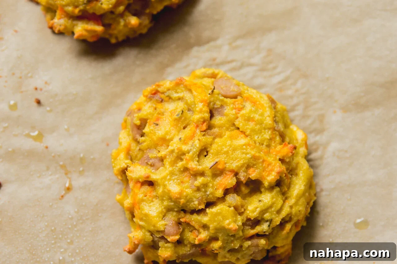 Energizing Protein Breakfast Bites 8 A cooked protein breakfast biscuit on a baking sheet.
