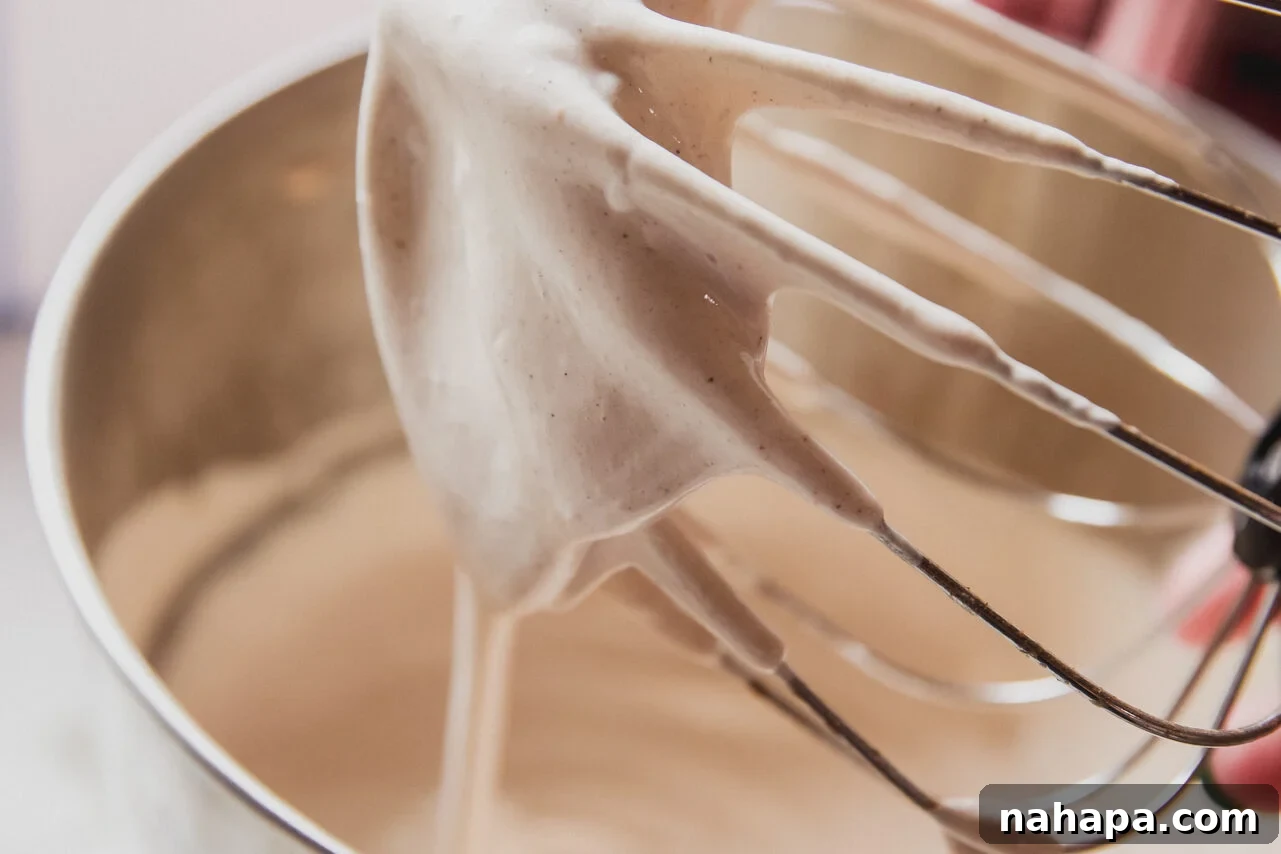 Pumpkin Spice Marshmallow Cloud 4 Pumpkin spice marshmallow fluff whipped in a stand mixer with the whisk attachment.